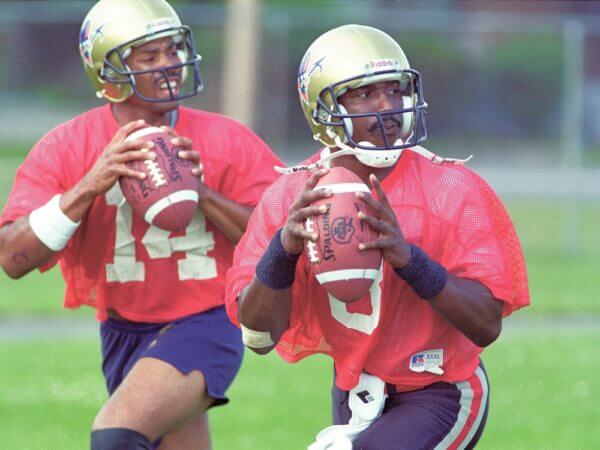 Ottawa Roughriders Marquel Fleetwood (#14), left, and Danny Barrett (#8) at practice, July 18, 1994. (Chris Mikula/Ottawa Citizen), neg. 94-5986